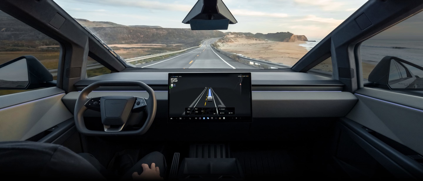 Interior view of vehicle driving with FSD (Supervised)
